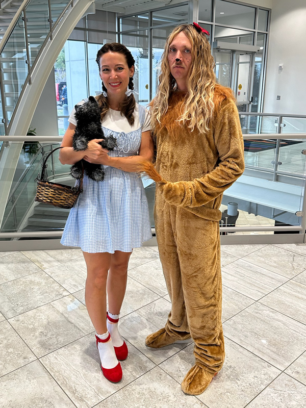 Employees dressed up as Dorothy and the cowardly lion for Halloween